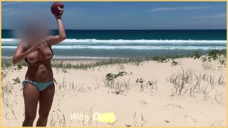 WifeyDoesWife gets her perfect tits out at the beach in her bikini-5