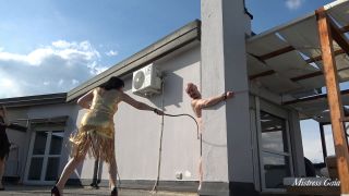 MISTRESS GAIA - WHIPPING IN TERRACE.-7